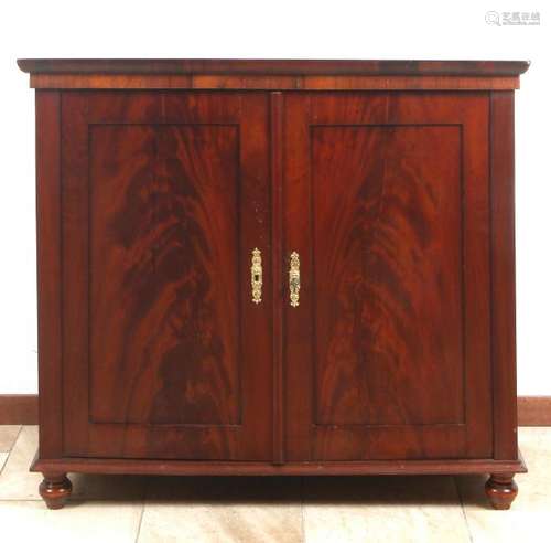 Two-door locker. Circa 1840. Mahogany veneered on