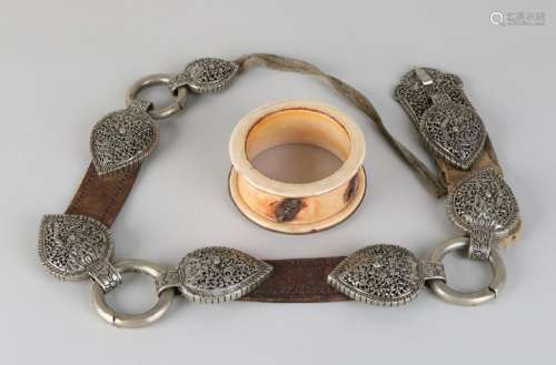 Antique ivory bracelet + old Oriental white metal belt.
