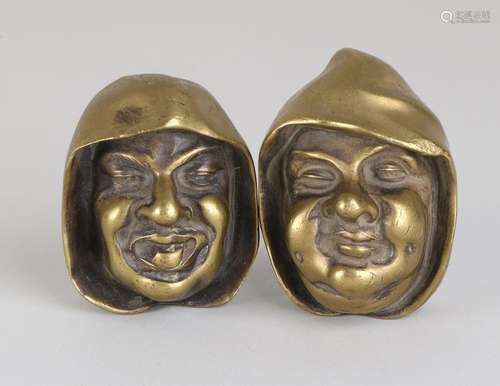 Two 19th century French bronze faces for on the wall.