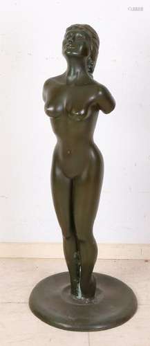 Very large naked bronze lady with ponytail. 20th