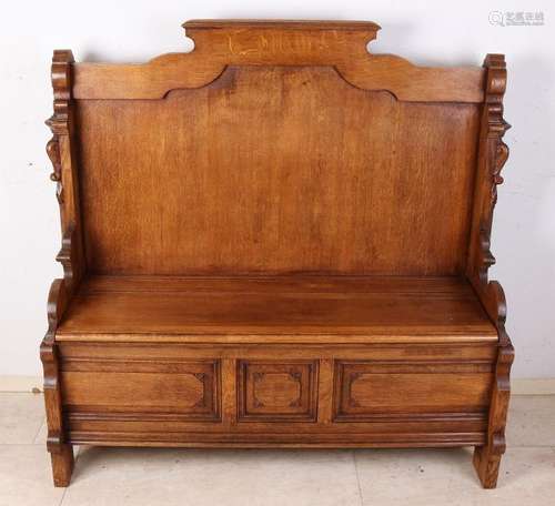 Antique oak hall / church bench with storage space.