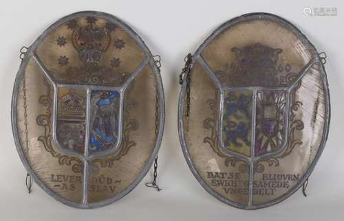 Two antique German stained glass-stained windows.