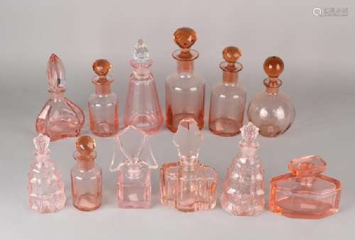 Twelve pieces of various glass bottles with various