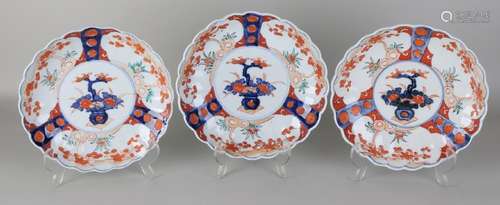 Set of three 19th century Imari porcelain plates with