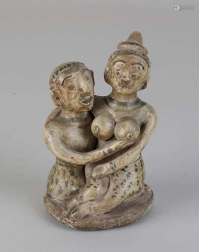 Antique Oriental glazed terracotta erotic figures.