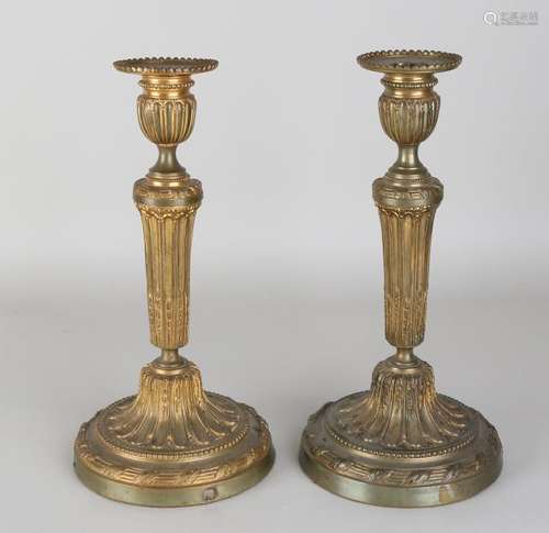 Two 19th century bronze gilt Empire-style candlesticks.