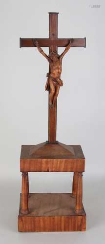 Early 19th century classicist crucifix on mahogany