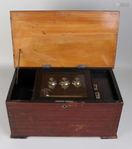 Large antique Swiss music box with various melodies and