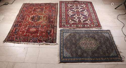 Three hand-knotted Persian carpets. Consisting of: Once