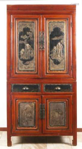 Chinese two-piece cabinet with front panels. Decorated