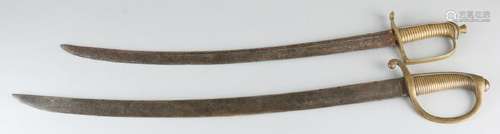 Twice 19th century sabers with brass handles. Size: 71