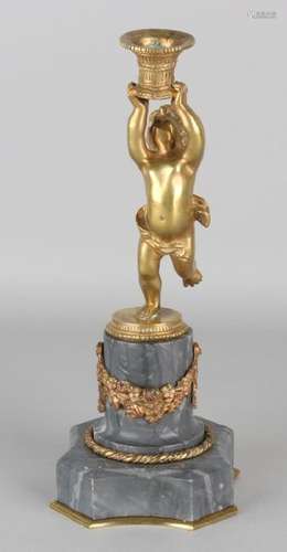 19th Century brass candlestick with putti, on marble