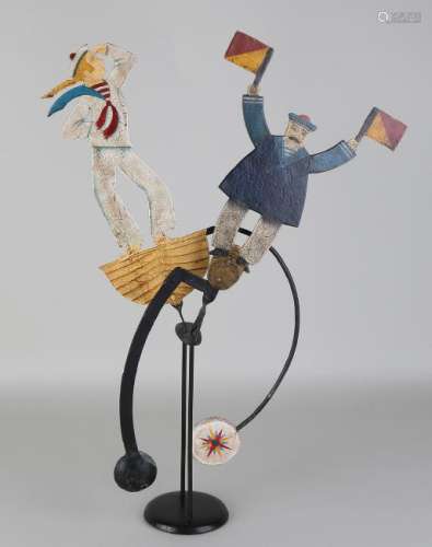 Decorative hand-painted swing figure with extra figure.