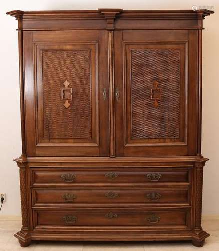 19th Century walnut cabinet with brass fittings. In