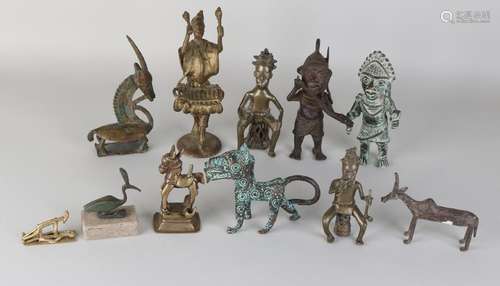 Eleven old / antique African / Oriental bronze figures.