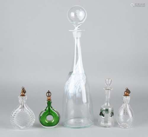 Five old glass stopper bottles / perfume bottles. 20th