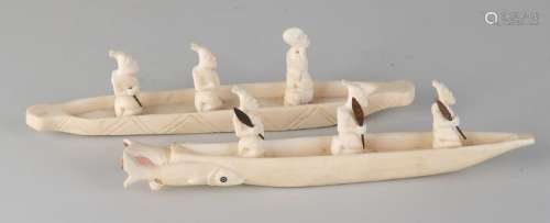 Two African ivory boats with figures. Circa 1930. One