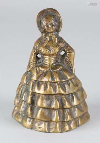 Antique bronze bell in the shape of a lady with a hoop