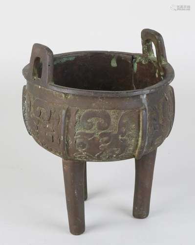 Very early Chinese bronze incense burner with signs.