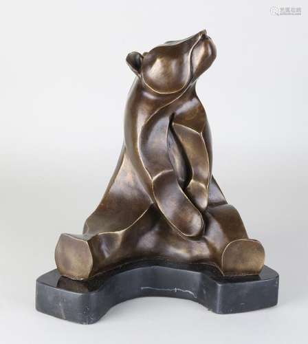 Bronze Art Deco style polar bear. On black marble