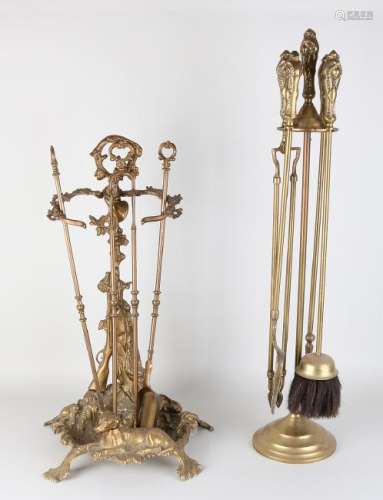 Two old brass fireplace sets. 20th century. Size: 57 -