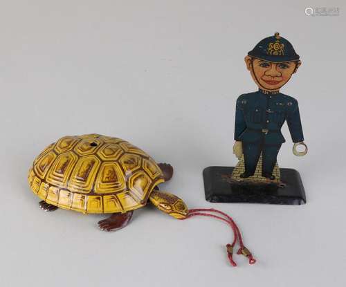 Two times old tin toys. Consisting of: Lehmann Susi