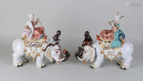 Two old porcelain Indian elephants with Indian nobleman