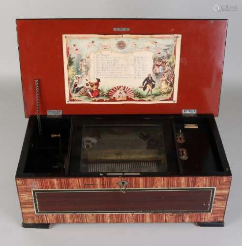 19th Century Swiss music box with ten melodies.