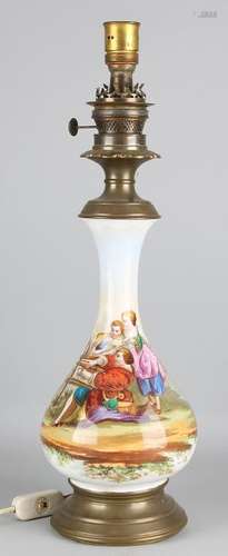 Antique porcelain electrified oil lamp with image.