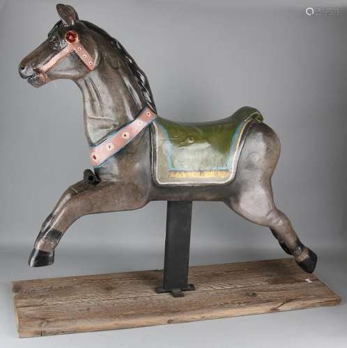 Old polychrome painted carousel horse. Mounted on