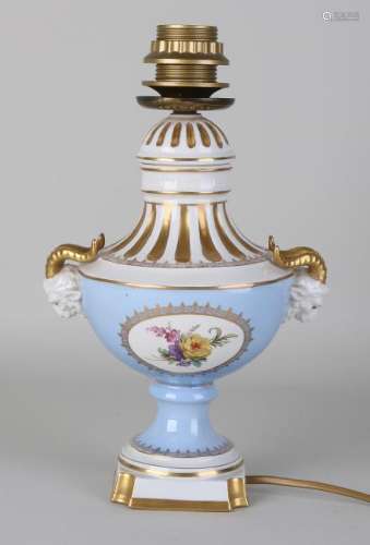 Old German Dresden porcelain table lamp with ram heads.