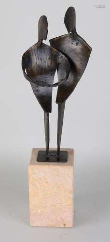 Large modern bronze sculpture. Two figures with a book.