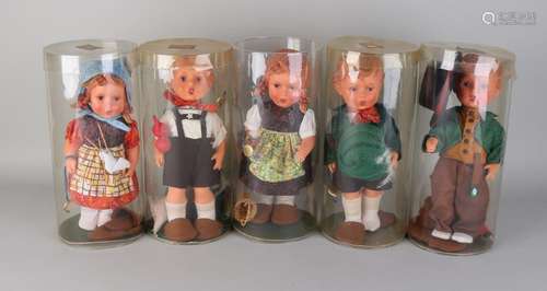 Five German Hummel figures in original packaging.