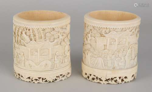 Two antique Chinese ivory brush holders with around