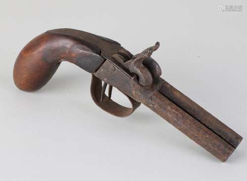 Early 19th century double-barreled pistol. Oxidation,