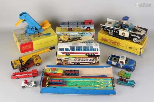 Lot of old toys. Among others Dinky Toys (three in box)