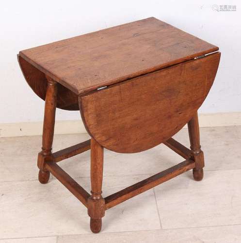 Antique small English oak wooden table. Circa 1900.