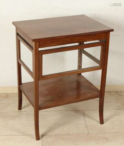 Antique mahogany tea table with floor and curved legs.