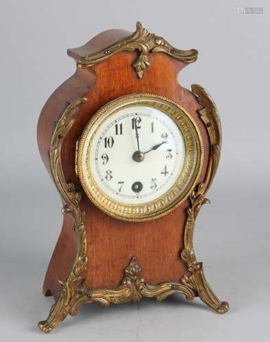 Antique walnut table clock with bronze. Circa 1890.