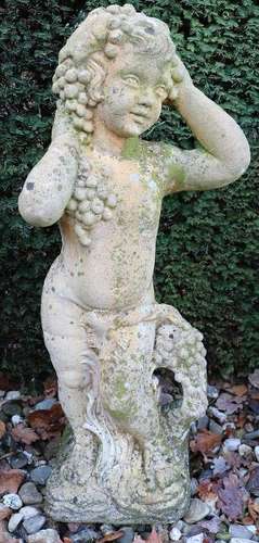 Old concrete poured garden image. Youth with grapes.