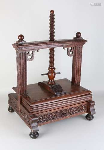 Small 18th century oak wood book press with carving and