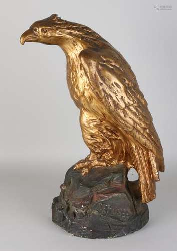 Large 19th century gilded French terracotta crow.