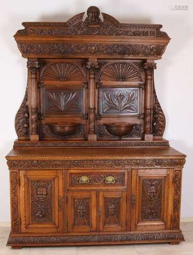 Large 19th century oak stoned sideboard with vines,