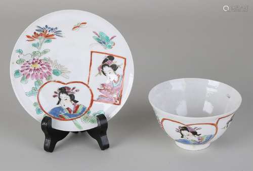 Antique Japanese porcelain cup and saucer with geishas.