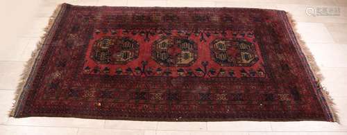 Old Persian hand knotted red rug with floral decors.