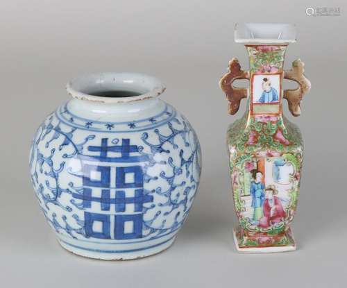 Two antique Chinese porcelain vases. Once blue-white,