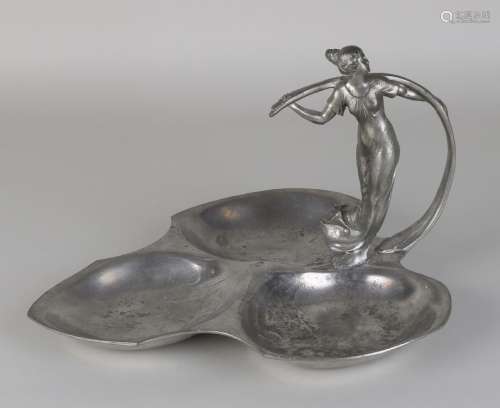 Antique pewter art nouveau bowl in lily-leaf shape.