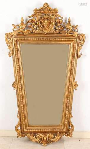 Antique historicism gold mirror with facet cut mirror.