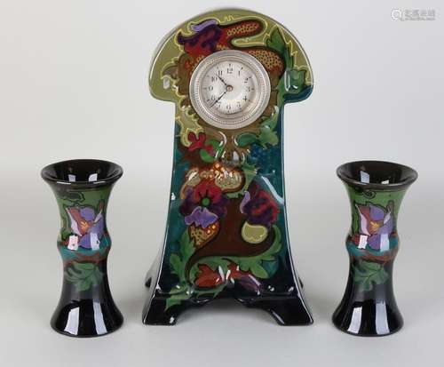 Gouda's polychrome pottery Art Nouveau clock set. Circa