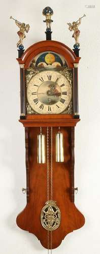 Walnut Frisian tail clock with date, alarm clock and